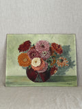 Unframed French oil painting of a zinnia and dahlia bouquet in a dark red vase, dated 1946