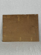 Reverse of the unframed French oil painting showing the brown fibreboard back of the canvas board