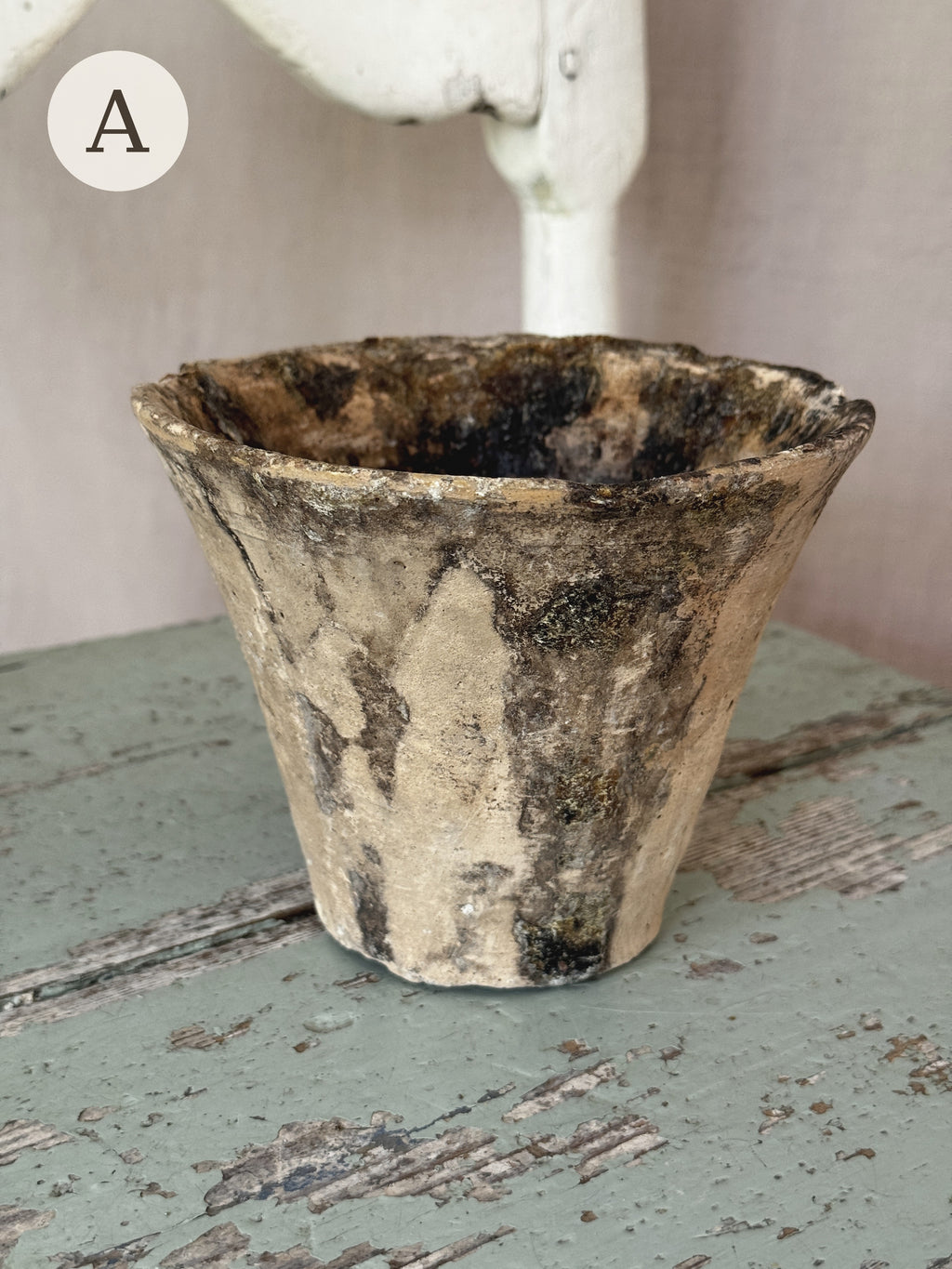 Resin pot A, pale sand terracotta streaked with dark pine resin, side view