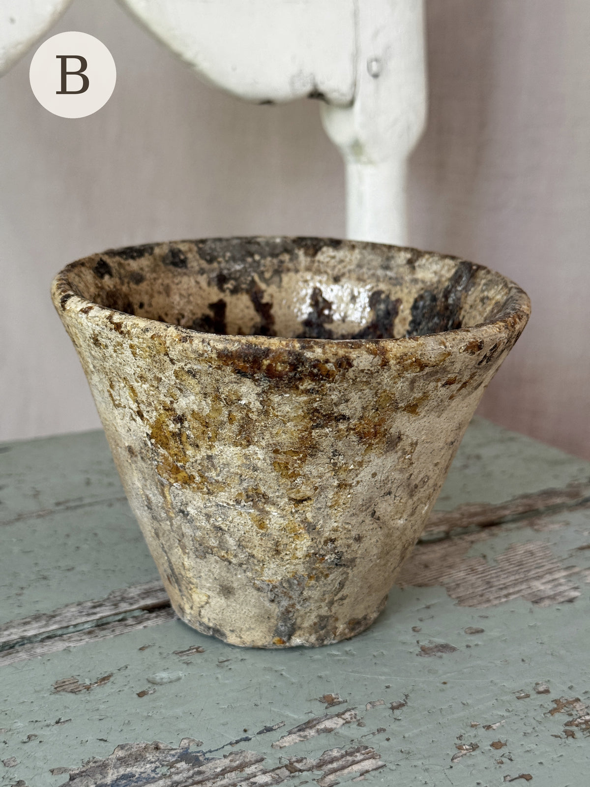 Resin pot B, speckled ochre terracotta with resin patina, side view