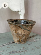 Resin pot D, warm salmon terracotta with amber resin spots, side view