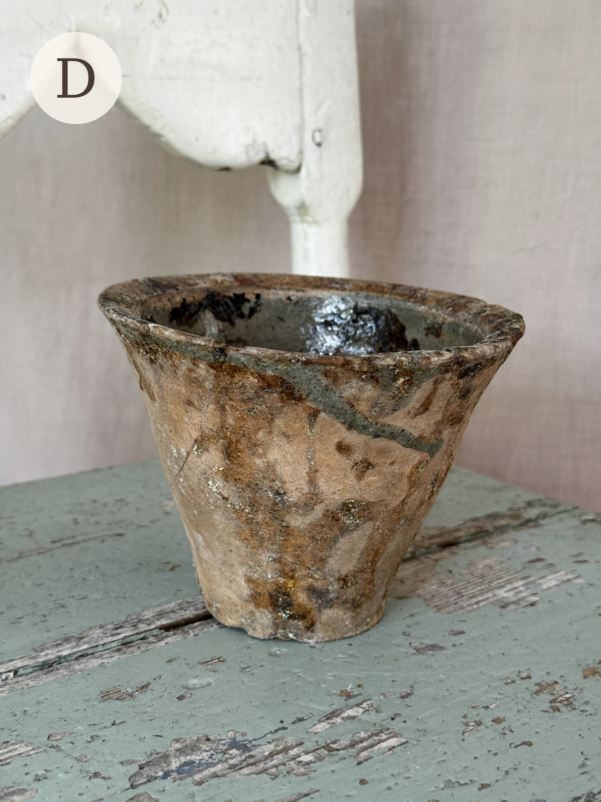Resin pot D, warm salmon terracotta with amber resin spots, side view
