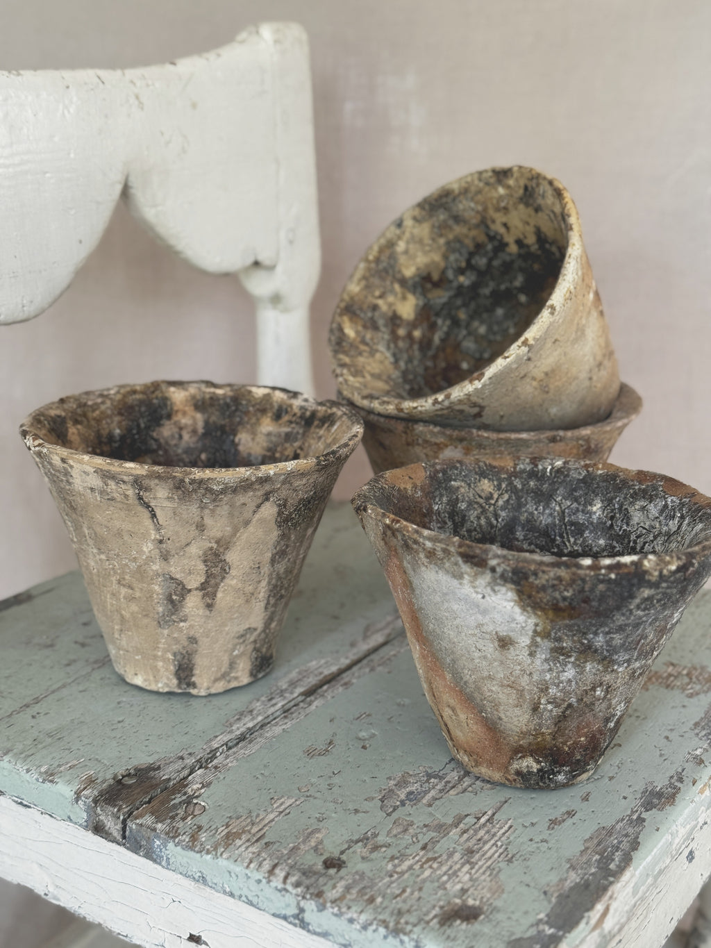 Antique French resin pots from the pine forest, grouped in natural light