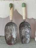 Pair of antique Swedish tin coffee scoops with cream and green painted handles