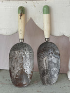 Pair of antique Swedish tin coffee scoops with cream and green painted handles