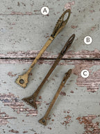 Reverse side of brass pastry jaggers A, B and C showing crimping tips