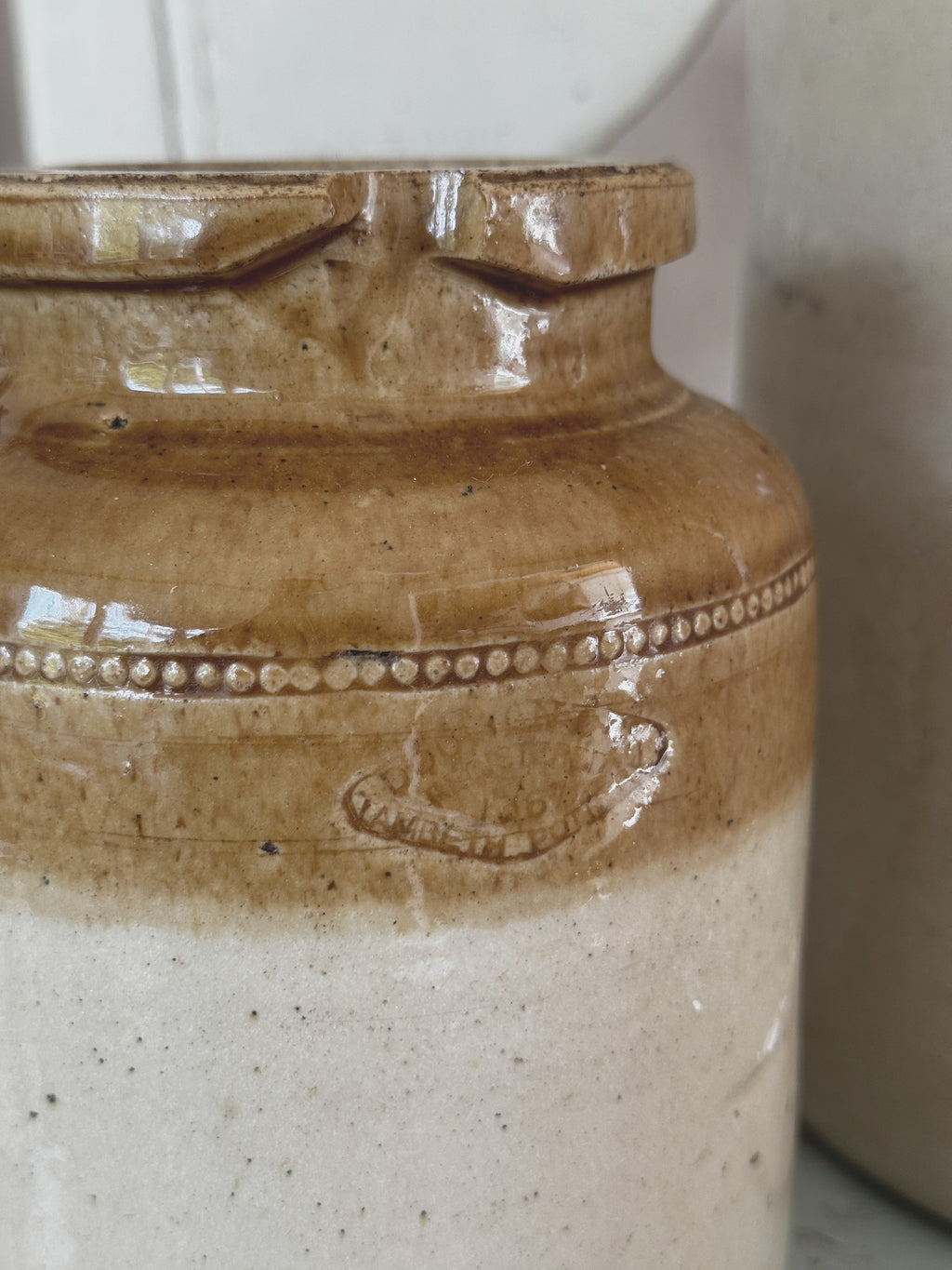 Beaded band and impressed Doulton Lambeth stamp on the jar