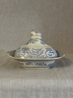 Antique English blue transferware covered vegetable dish with a recumbent lion finial, softly crazed
