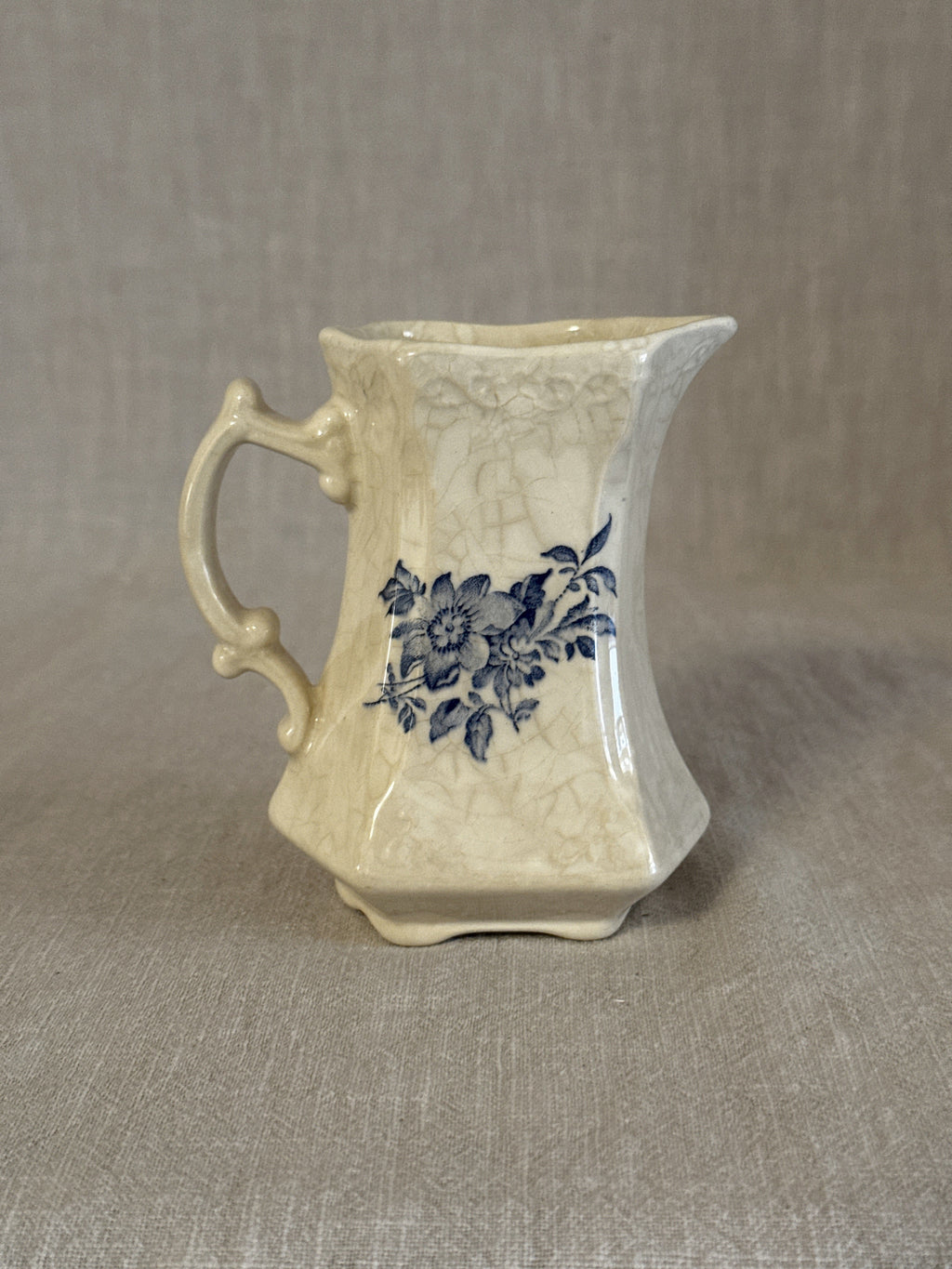 Crown Devon cream jug with blue floral transfer, one of a pair of small English cream jugs