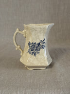 Crown Devon cream jug with blue floral transfer, one of a pair of small English cream jugs