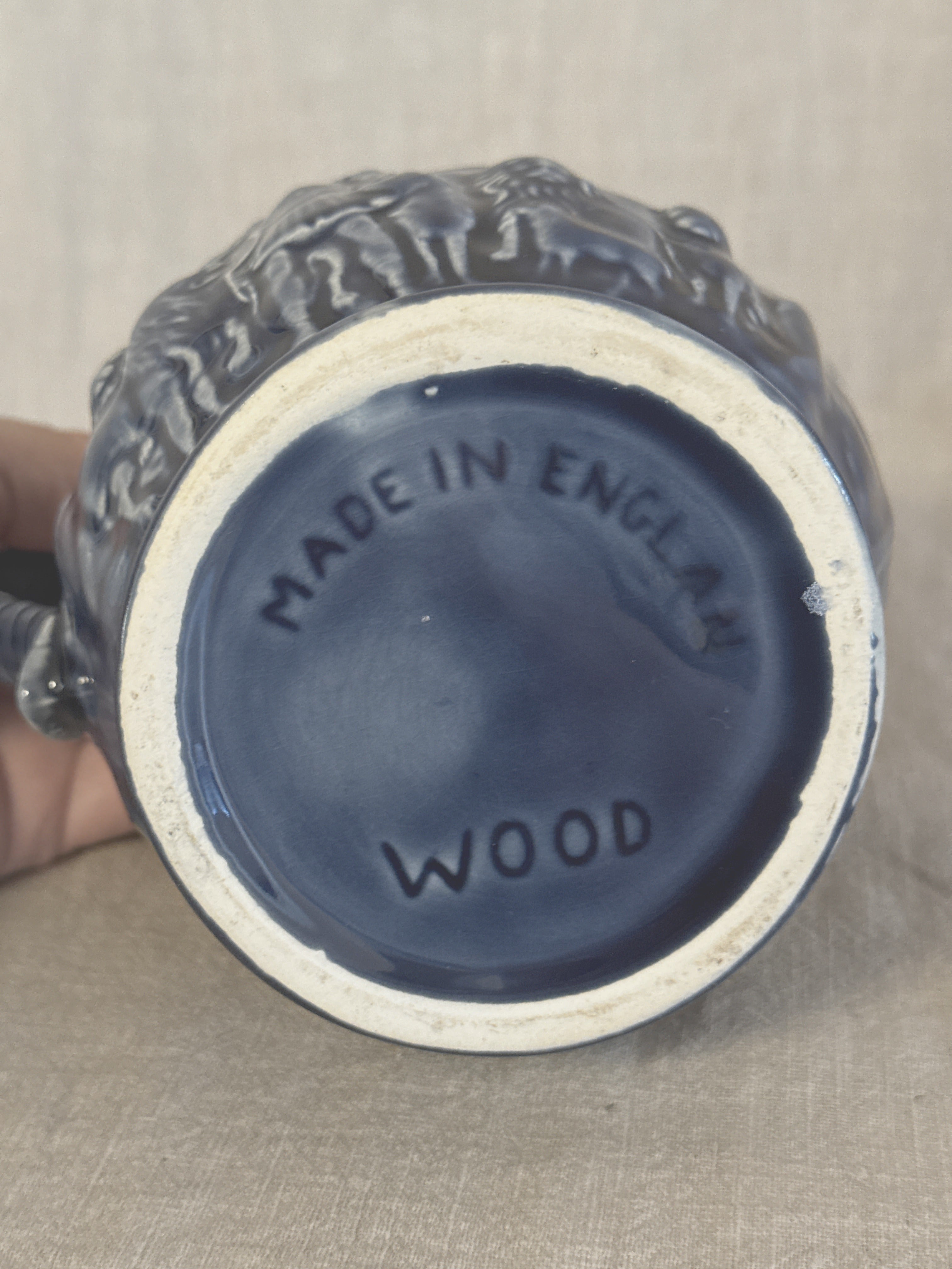 Base of the blue relief jug impressed MADE IN ENGLAND and WOOD