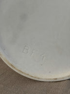 Base of the tall white jug with an impressed BF 4 mould mark