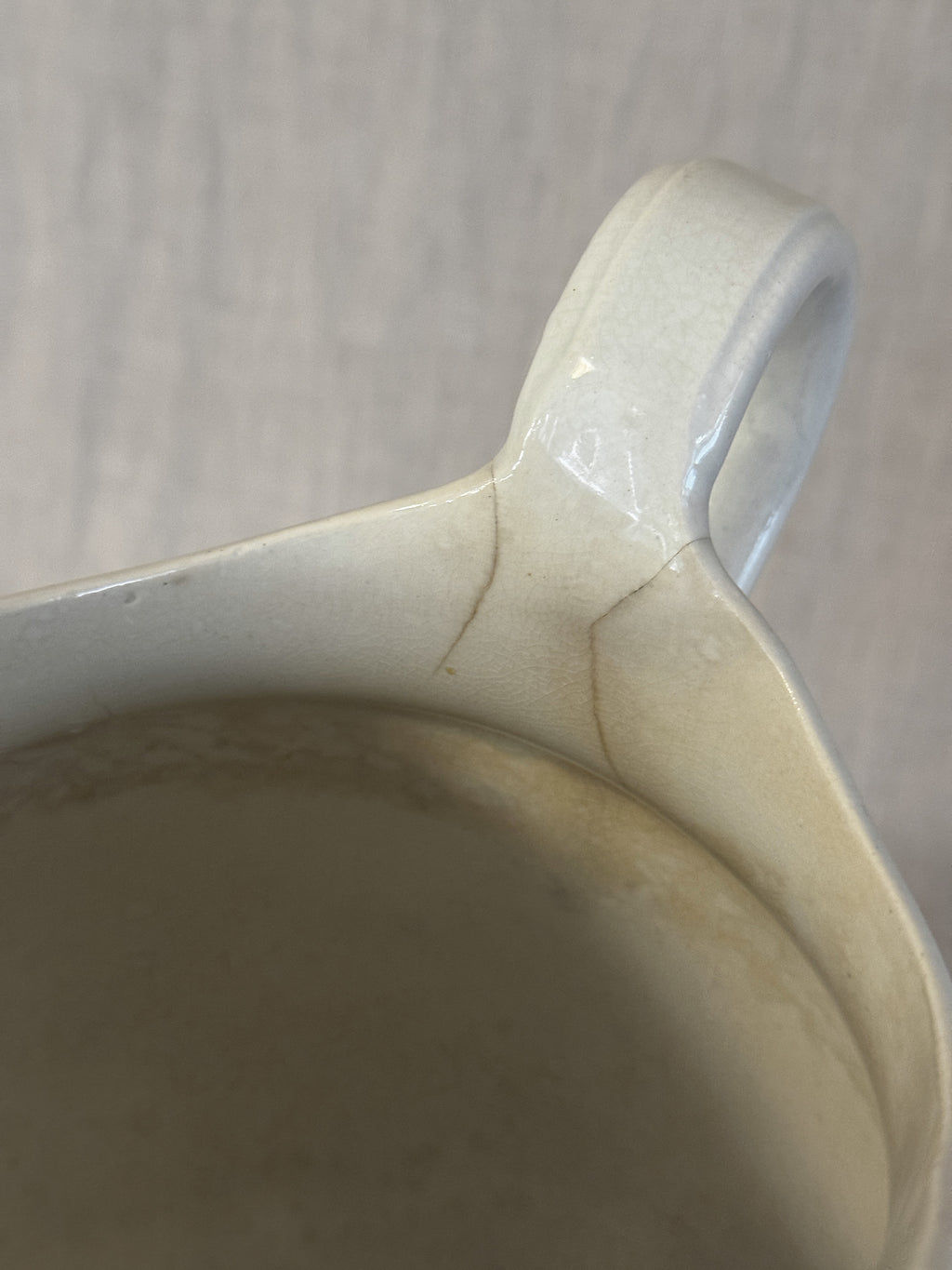Detail of the handle where it meets the body of the washstand jug