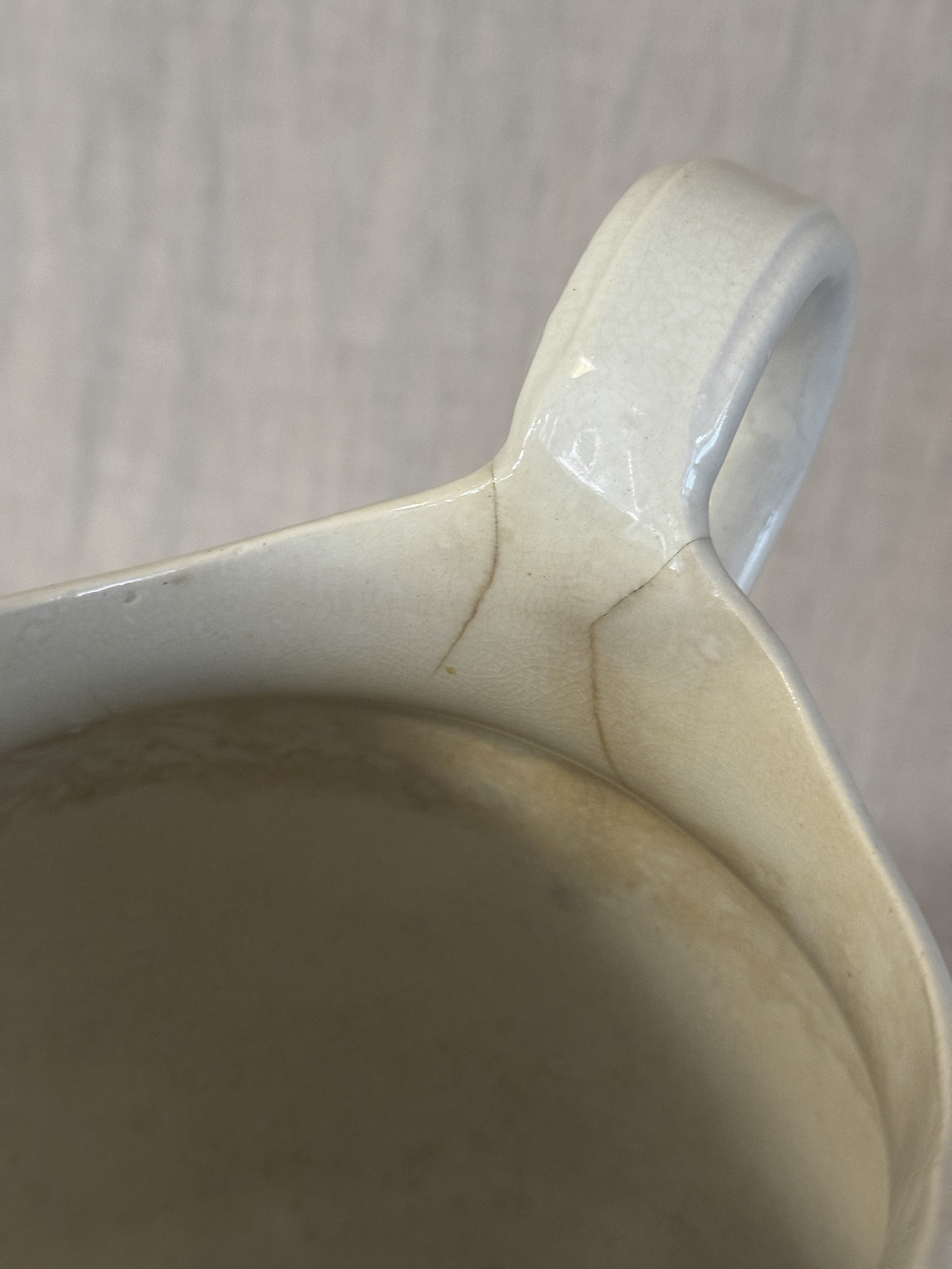 Detail of the handle where it meets the body of the washstand jug