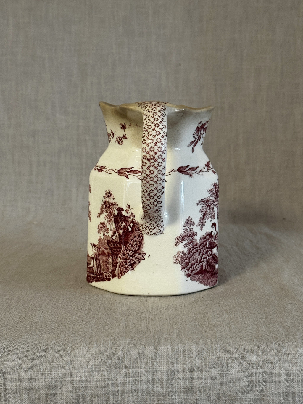 Side view of the octagonal Watteau jug showing the red transfer and the handle