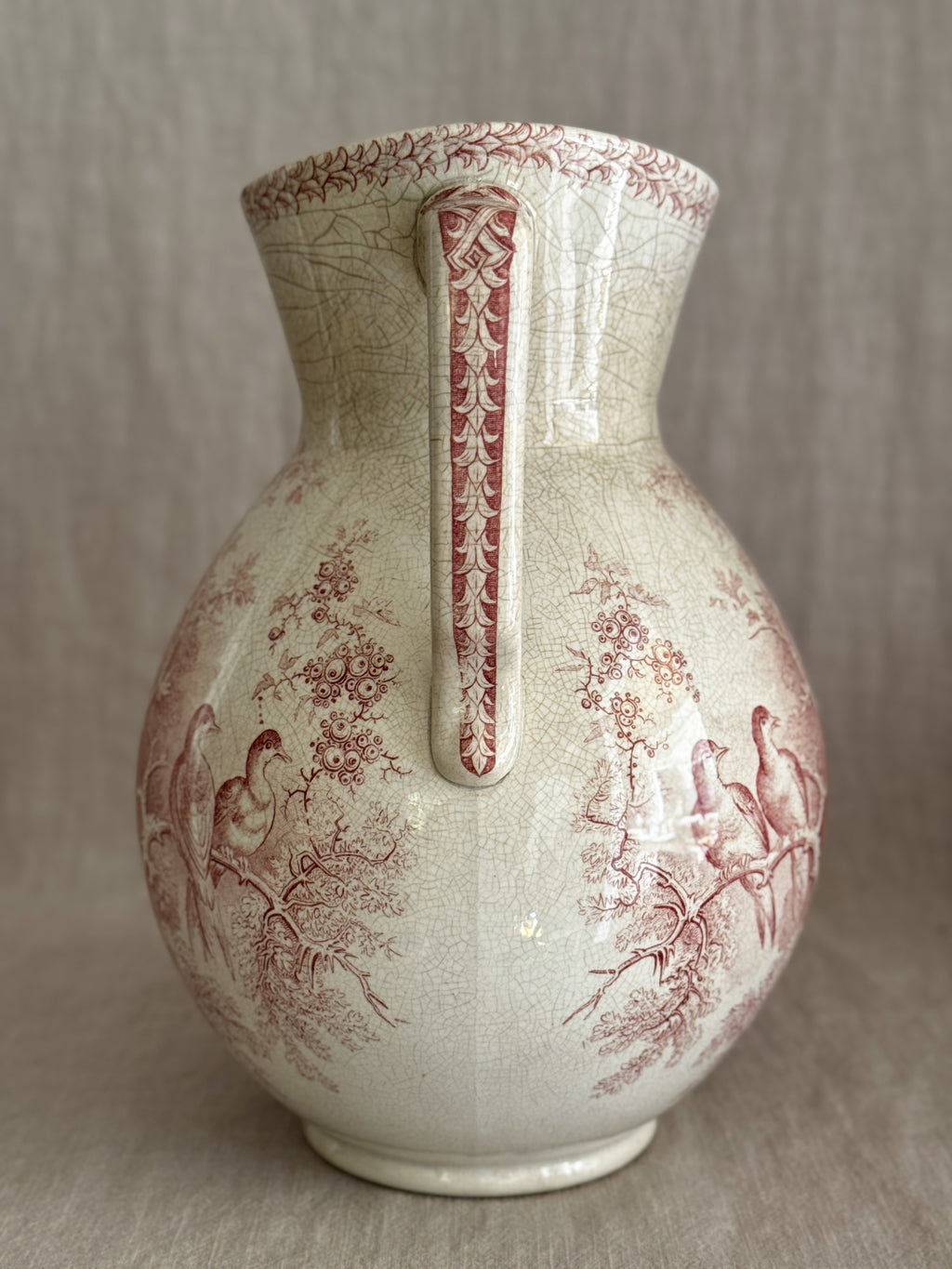 Angled view showing the beaded band running along the ridge of the handle