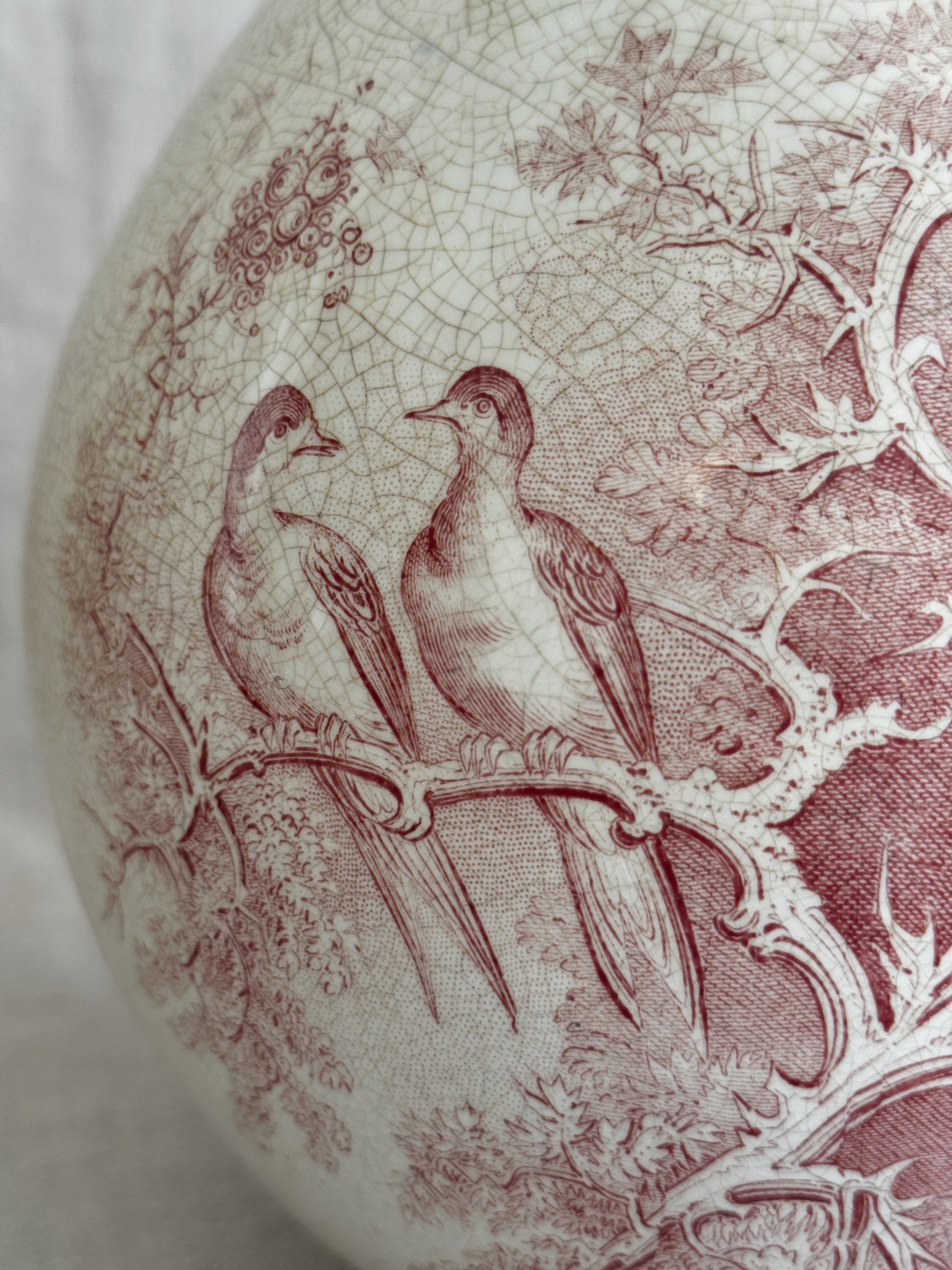 Detail of the upper body where the transfer pattern meets the fine crazing of the glaze