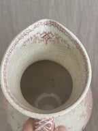 Looking down into the jug interior with the printed rim border visible