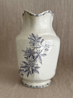 Angled view of the purple transferware jug showing the body and neck