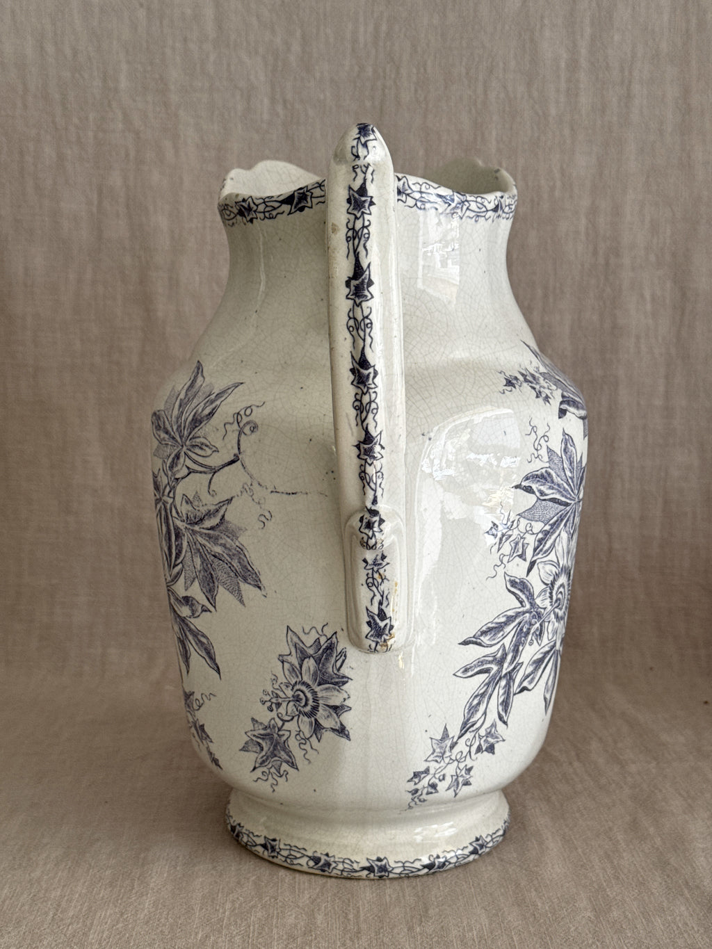 View of the spout and rim of the jug showing the printed border