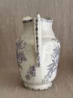 View of the spout and rim of the jug showing the printed border