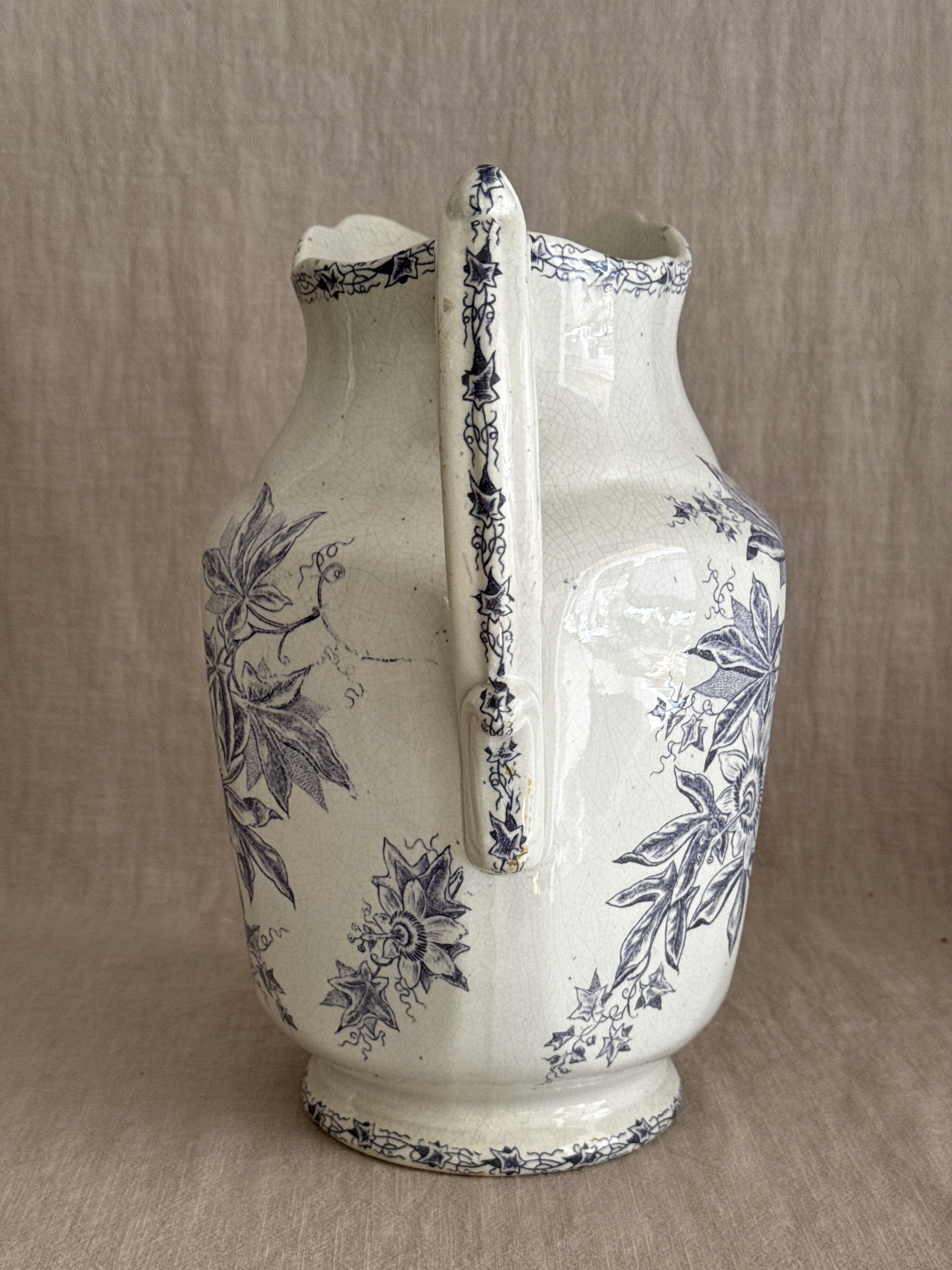 View of the spout and rim of the jug showing the printed border