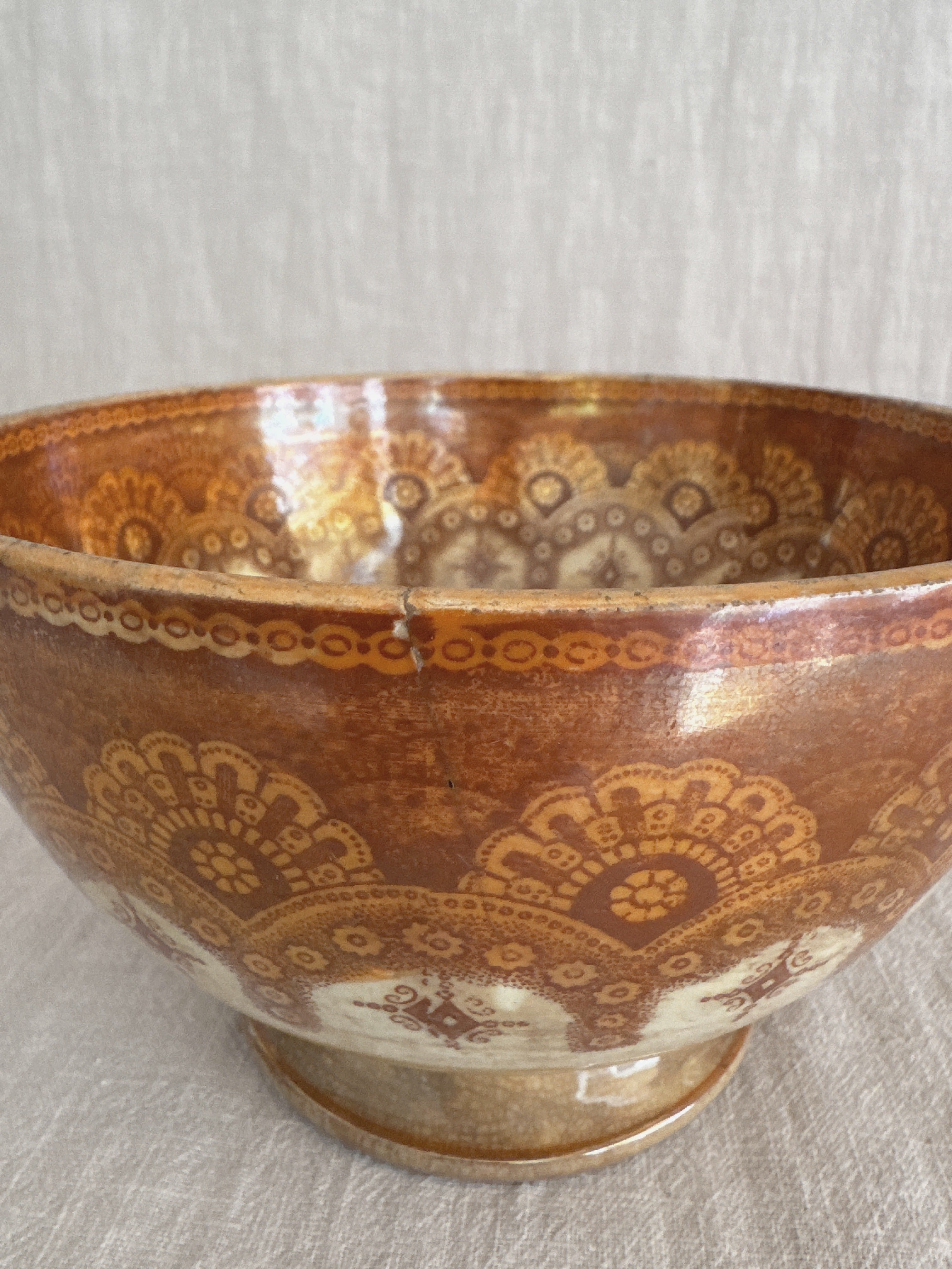 Looking down into the lustre bowl showing the printed rosette medallion in the well