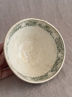 Looking into the bowl interior with the printed leaf border along the rim
