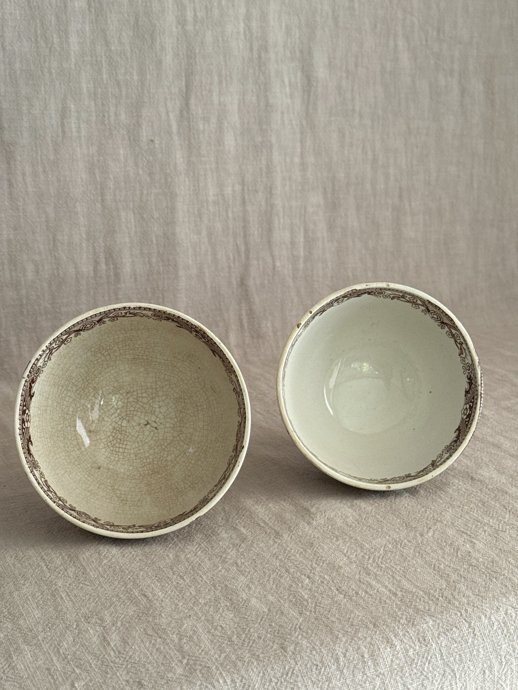 Both bowl interiors seen from above, showing the difference in patina between them