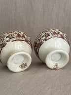 Undersides of the pair showing the printed PORCELAINE OPAQUE marks with crowned cartouche and FRANCE