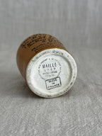 Base of the ochre pot showing MAILLE 1747, MODÈLE DÉPOSÉ and the 12/13 CL capacity mark