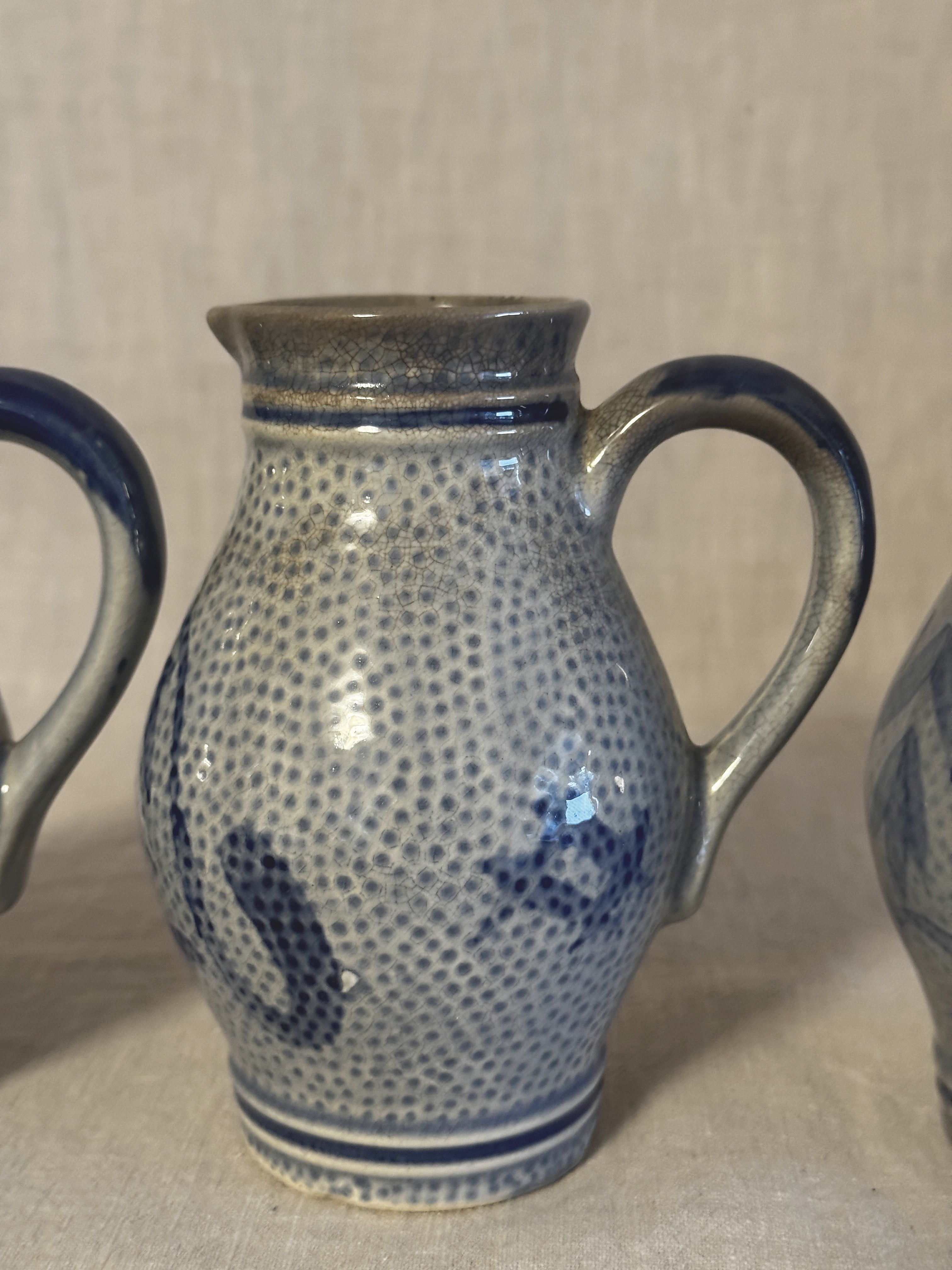 Detail of the cobalt decoration and banding on the grey salt-glazed body