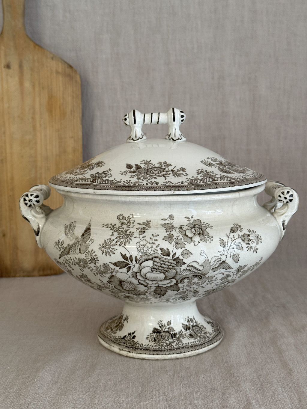 Antique Swedish footed soup tureen in brown transferware with pheasant and peony print, lid in place