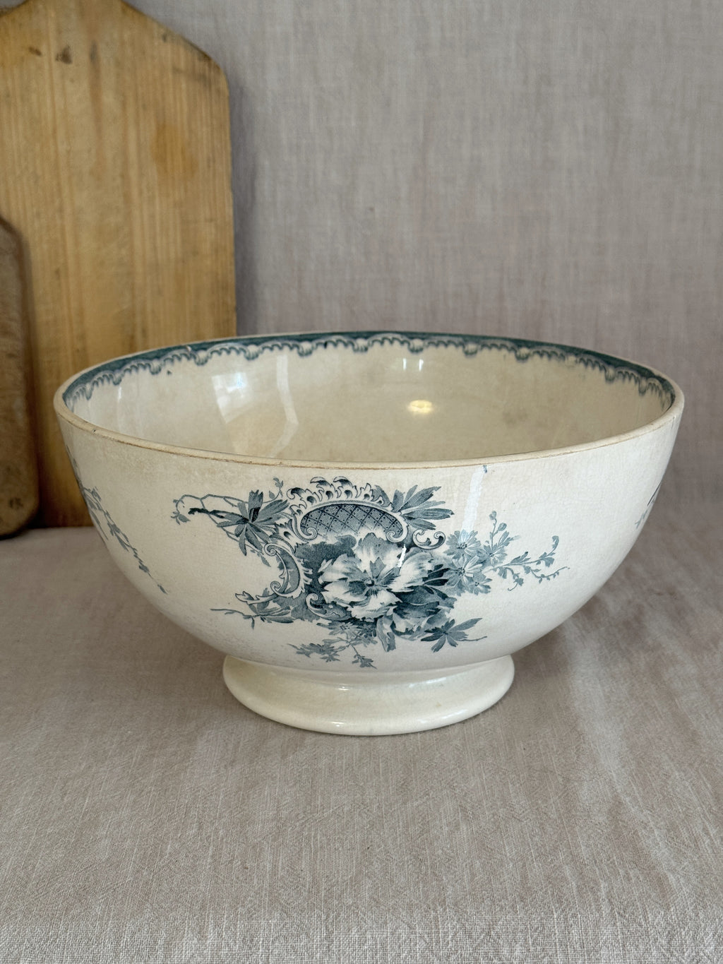 Large Swedish transferware salad bowl by Göteborgs Porslinsfabrik, side view showing the floral bouquet and low foot