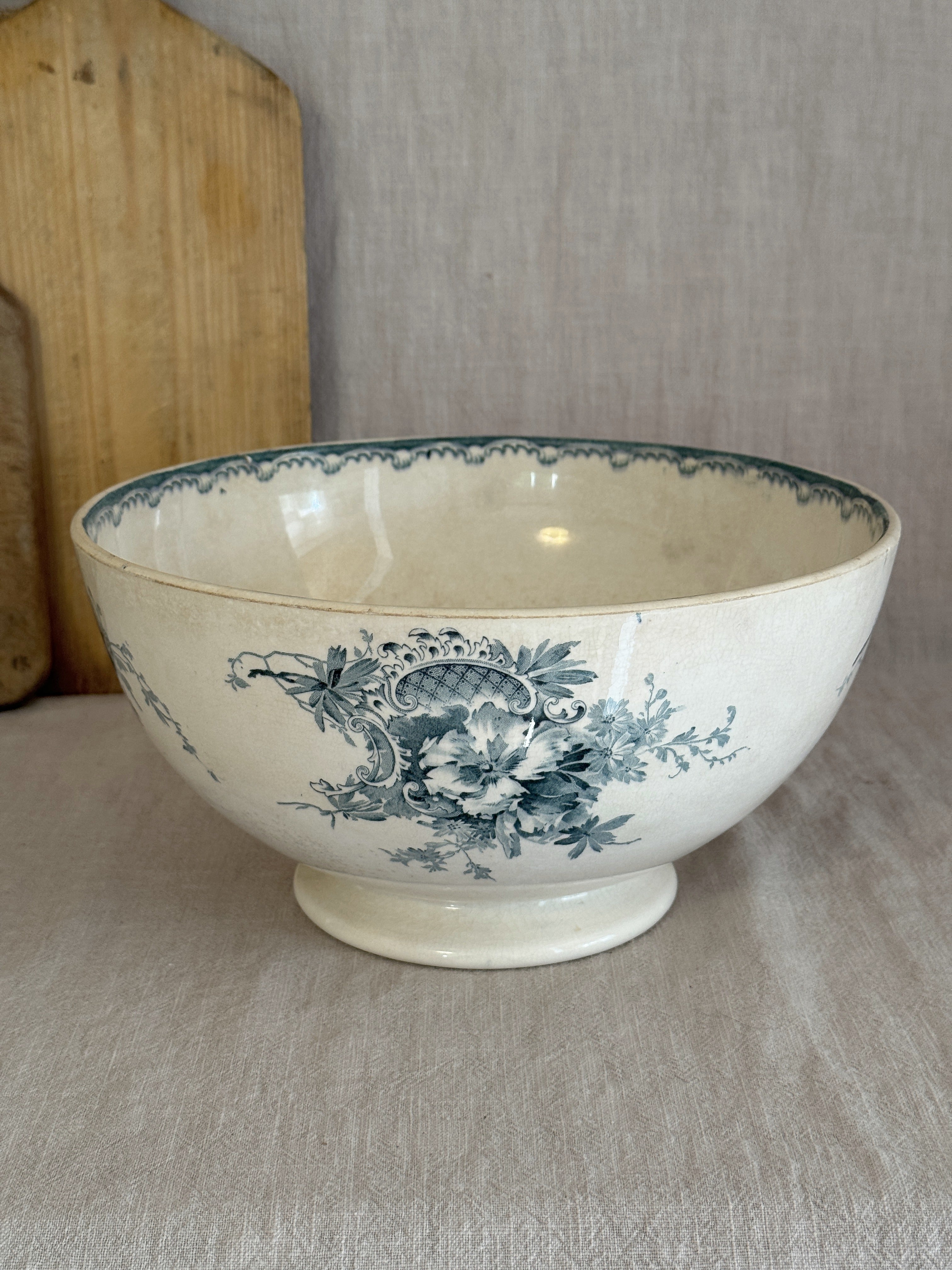 Large Swedish transferware salad bowl by Göteborgs Porslinsfabrik, side view showing the floral bouquet and low foot