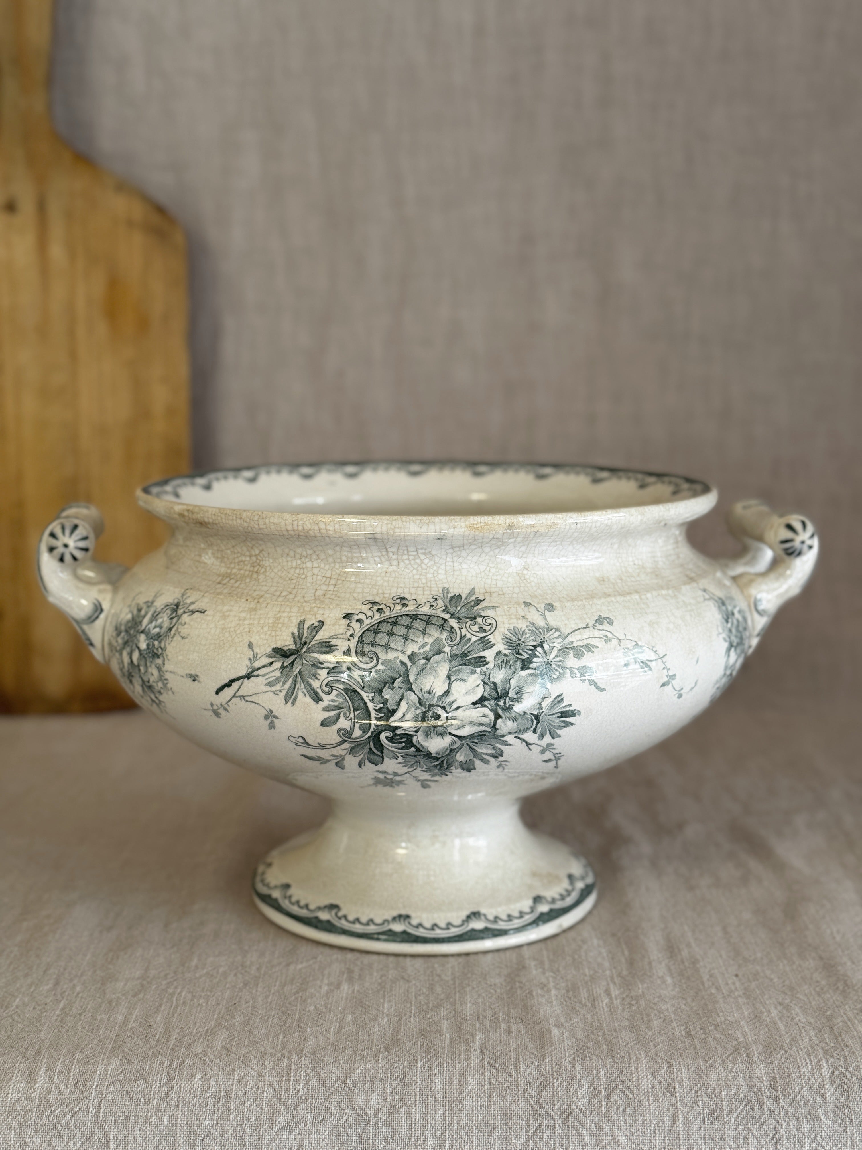 Antique Swedish Anna pedestal bowl in blue-green transferware, seen from the side with its two scrolled handles