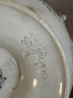 Detail of the impressed Göteborg mark in the clay on the base of the Swedish flintware bowl