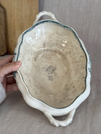Interior of the antique Swedish tureen showing warm honey crazing across the earthenware
