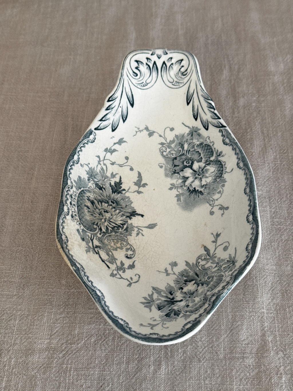 Antique Swedish ravier in teal transferware, the Anna pattern, seen from above on linen