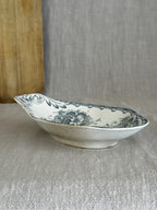 Side profile of the antique Swedish ravier on its low oval foot ring