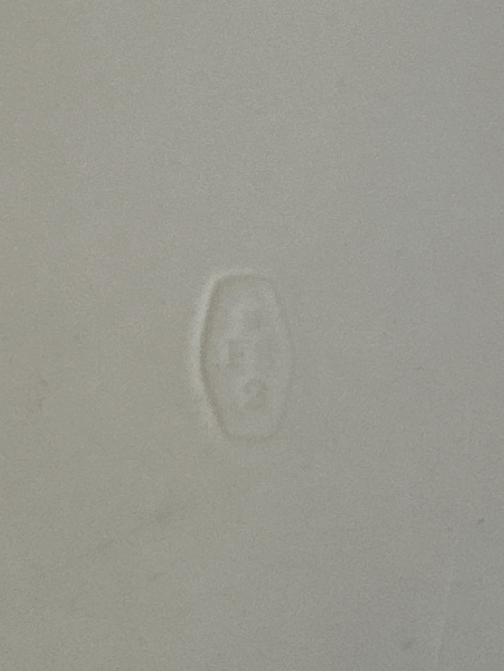 Deeply impressed cartouche mark reading B, FS and 2 on the back of the white faience board