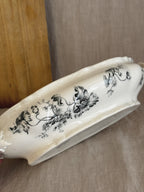 Rörstrand Papaver poppy transfer in grey-green on the side of a white Swedish earthenware bowl