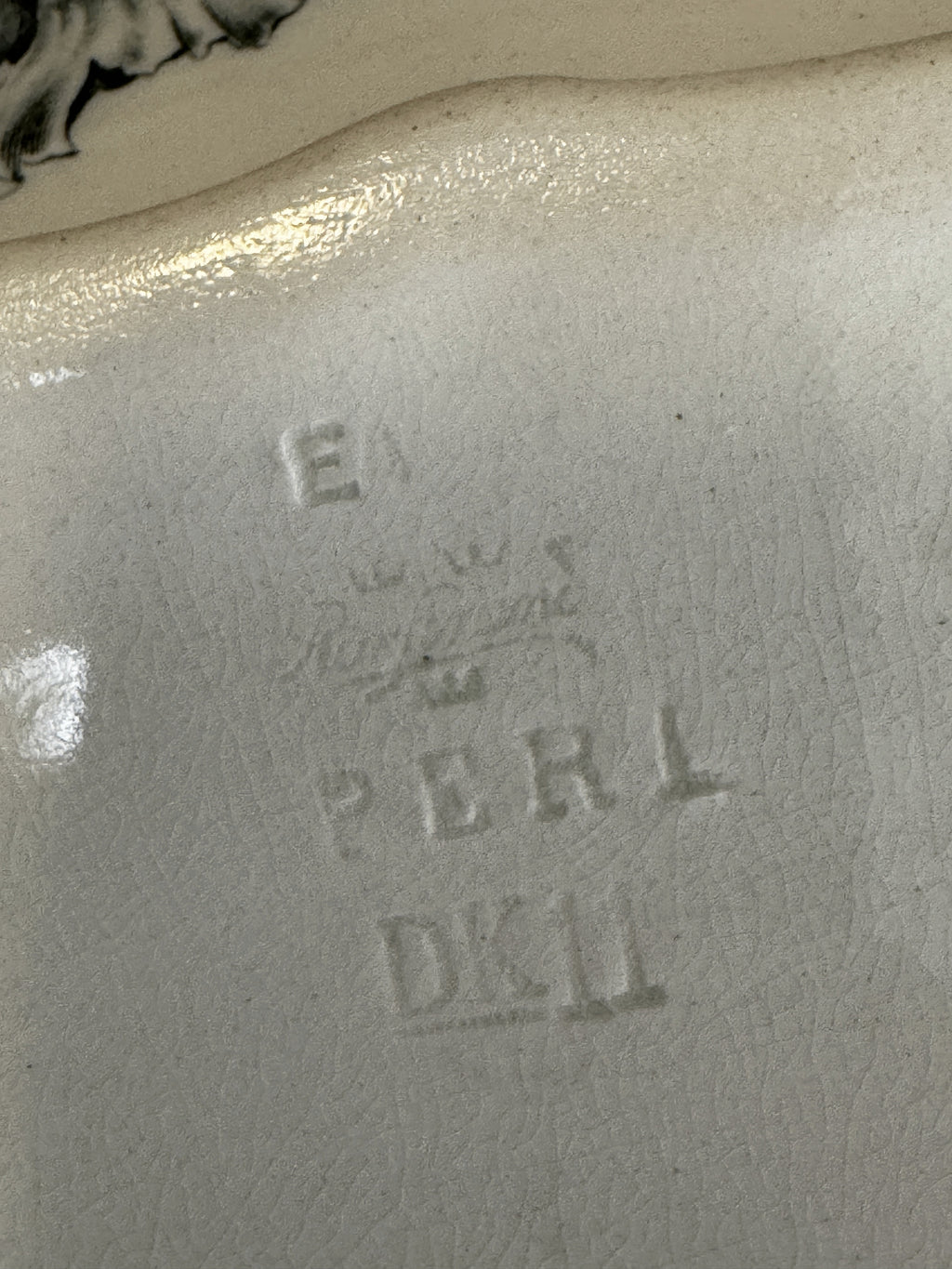 Impressed Rörstrand crown mark with the model name PERL and code DK11 on the base