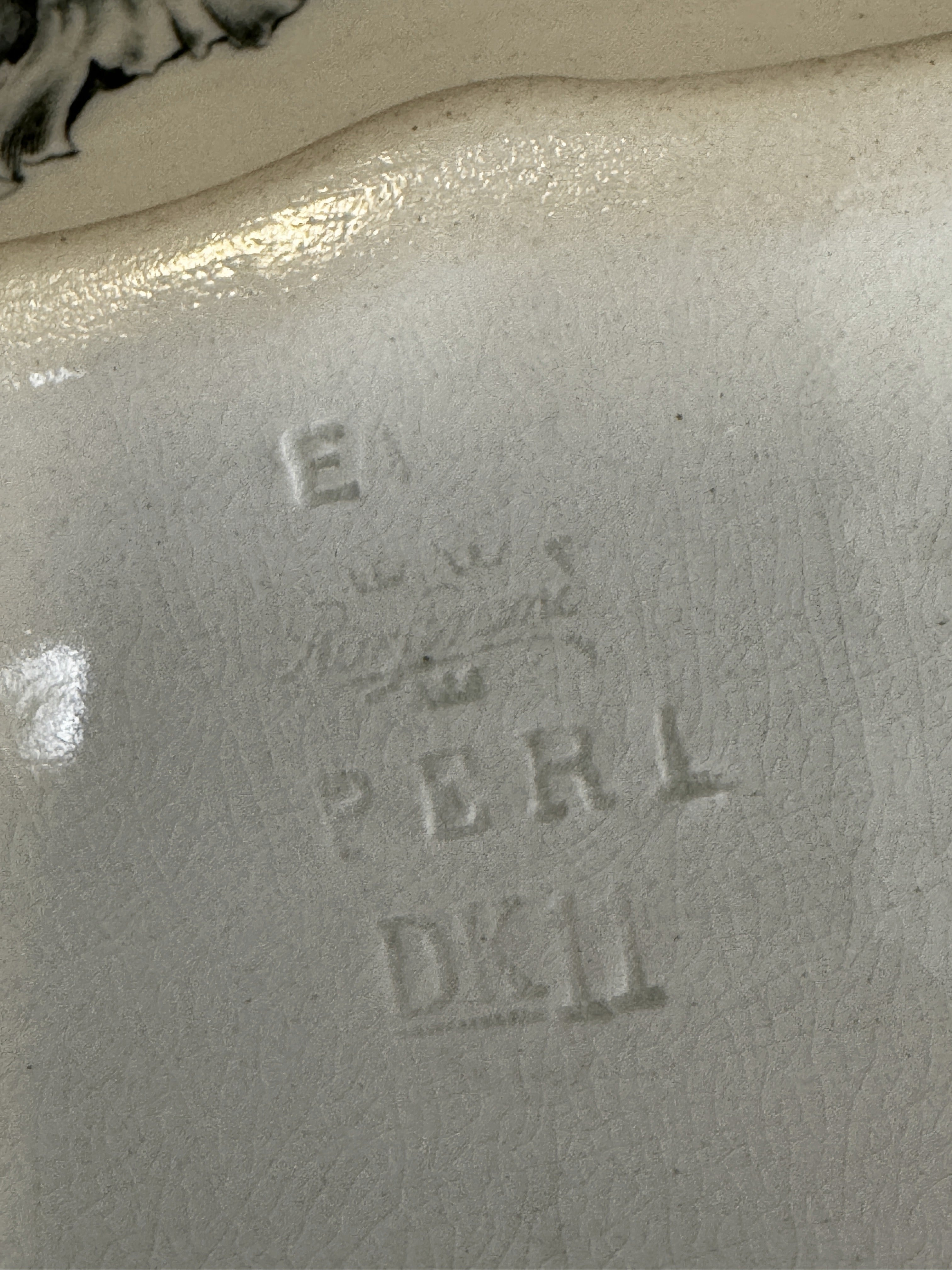 Impressed Rörstrand crown mark with the model name PERL and code DK11 on the base