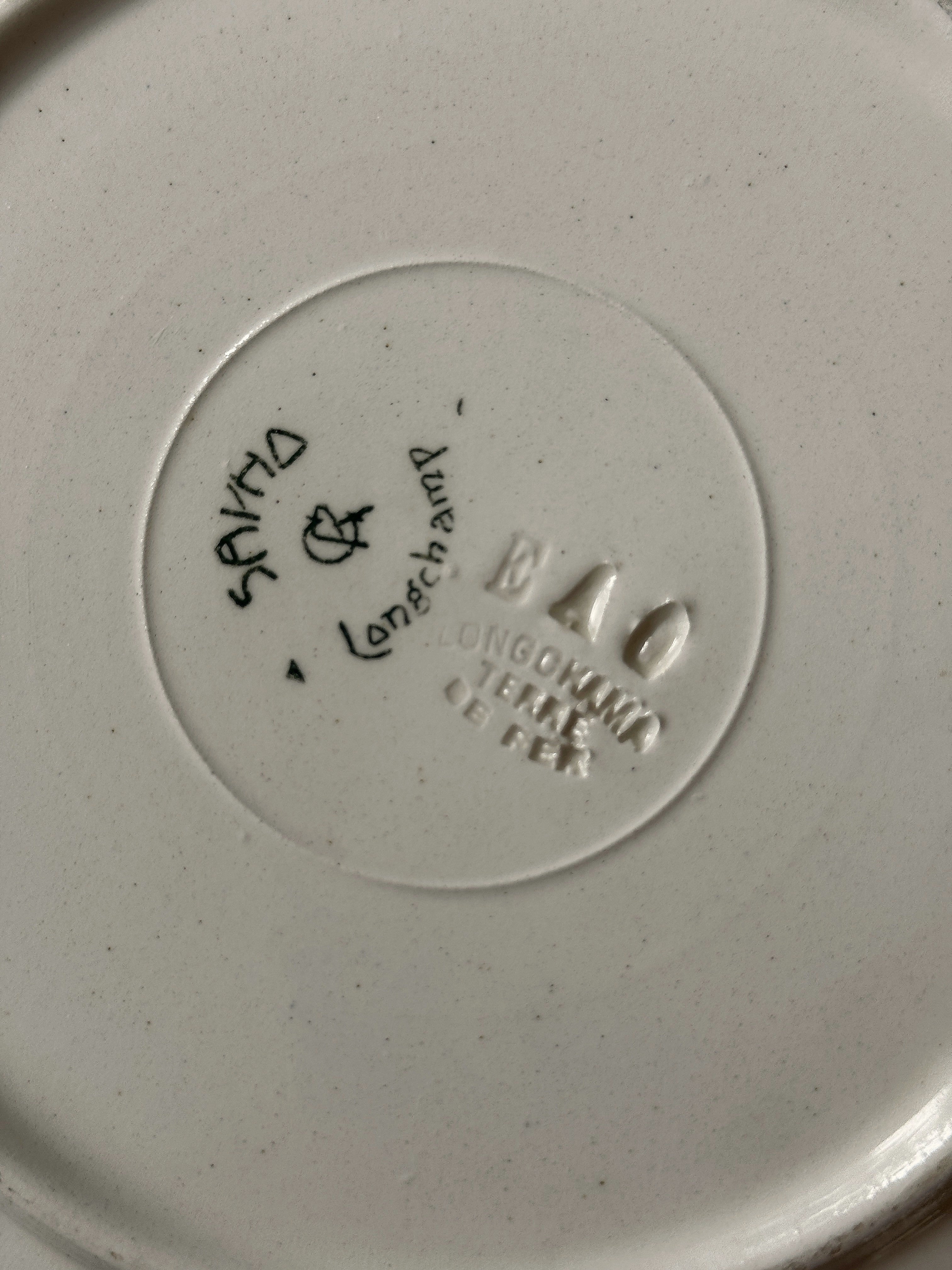 The Longchamp Sapho Plates