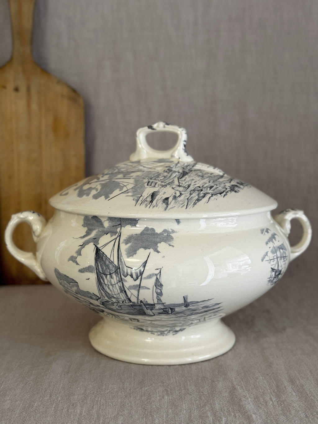 Antique French Longchamp soup tureen in terre de fer with blue-grey maritime transfer, lid in place, seen from the front
