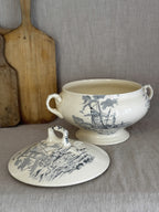 Longchamp soup tureen with the lid lifted off, showing the footed bowl and the blue-grey harbour scene