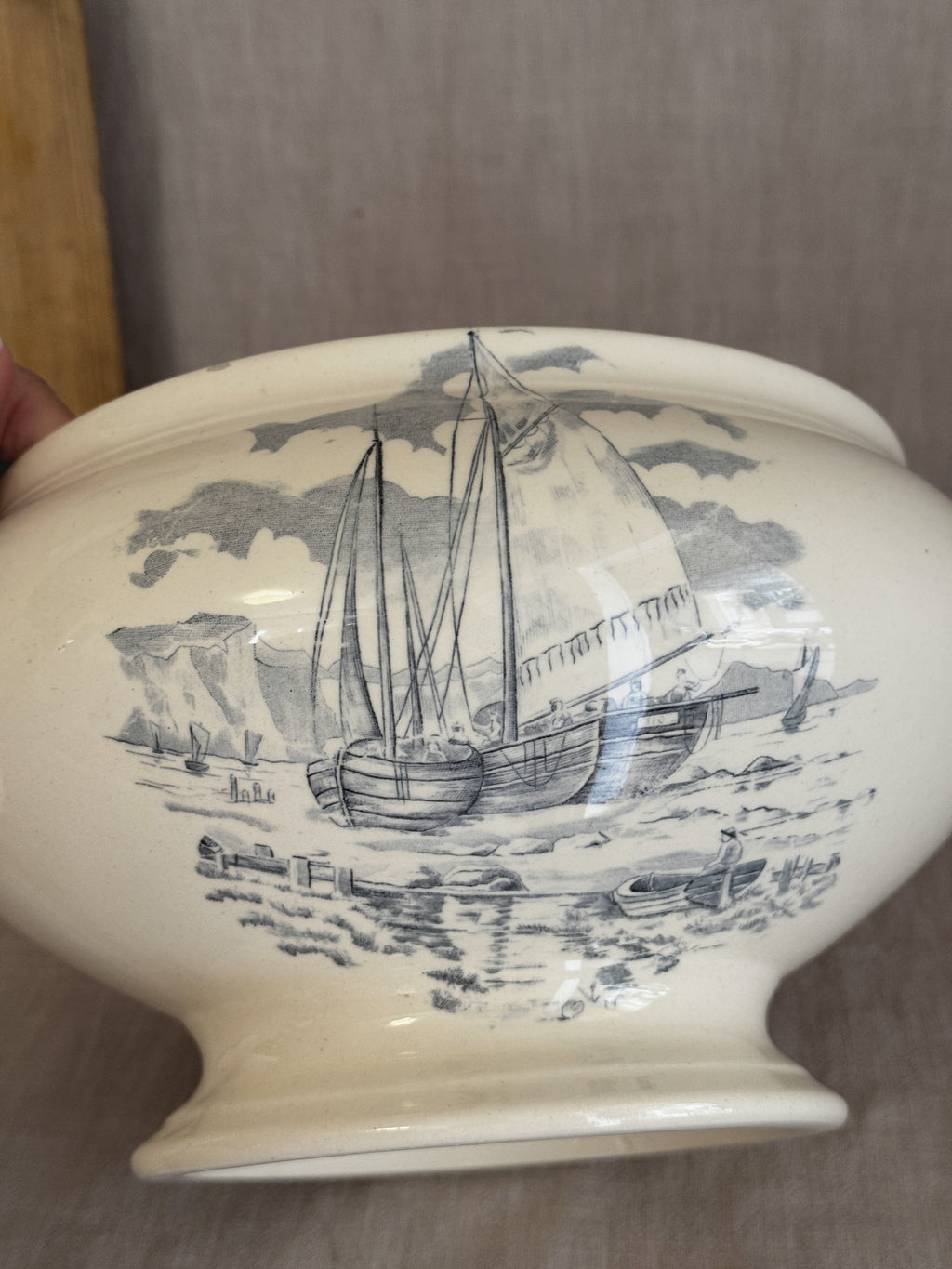 Close view of the two-masted sailing ship transfer on the reverse of the antique French tureen