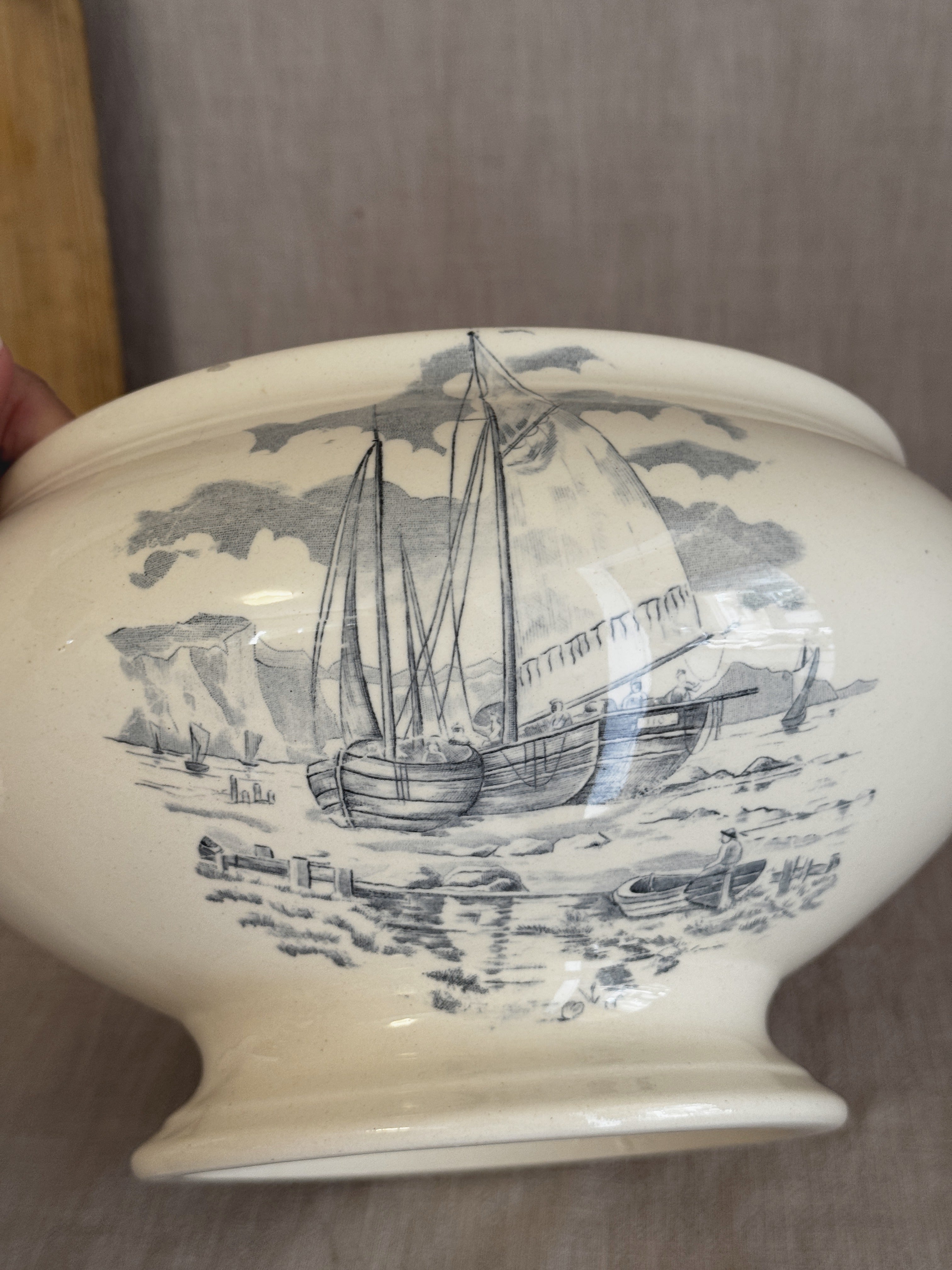 Close view of the two-masted sailing ship transfer on the reverse of the antique French tureen
