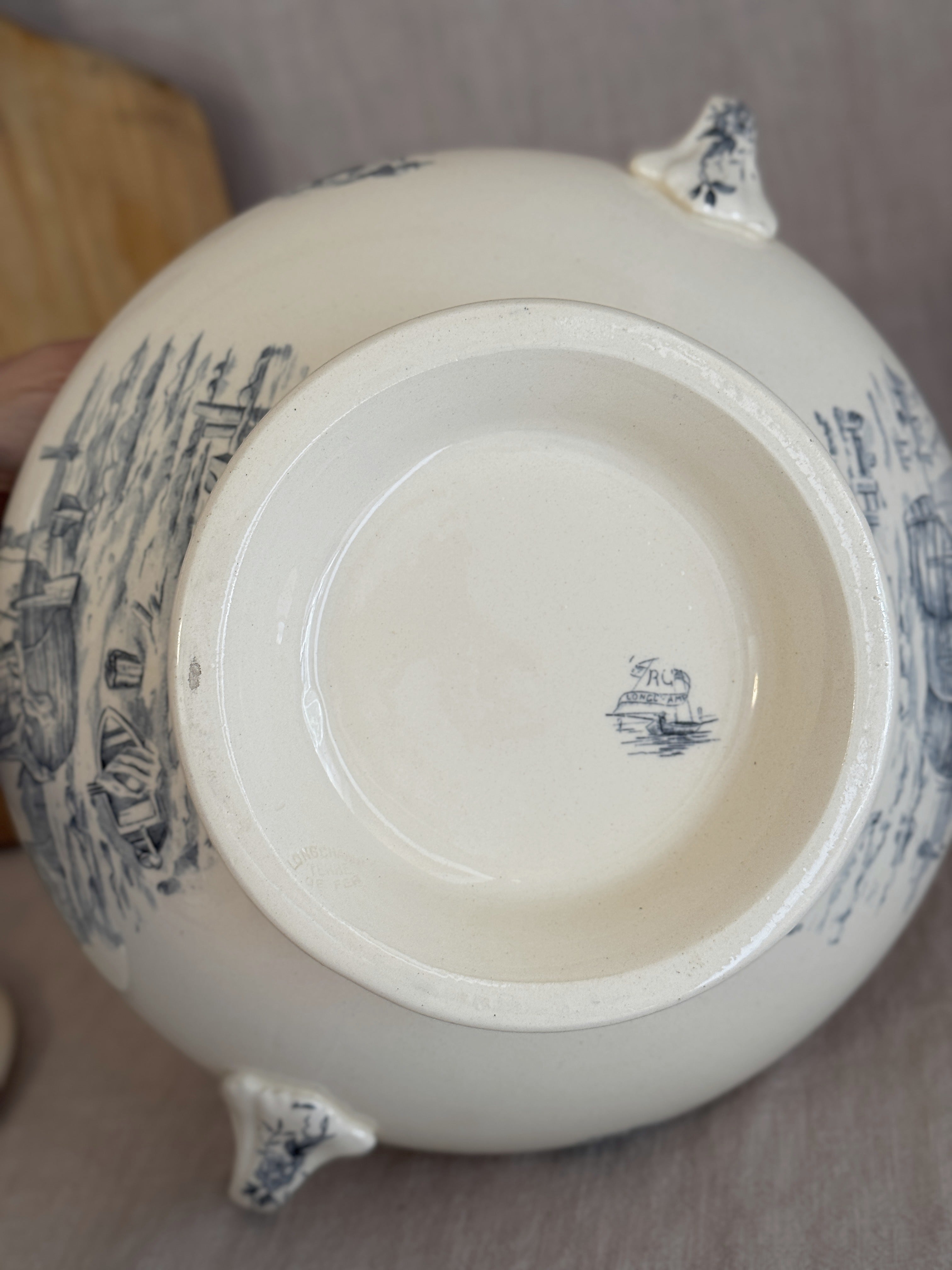 Base of the Longchamp tureen showing the printed maker's estampille inside the foot ring